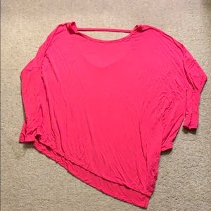 Fun asymmetrical reversible shirt.